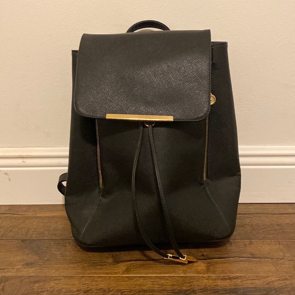 Black backpack with gold details
